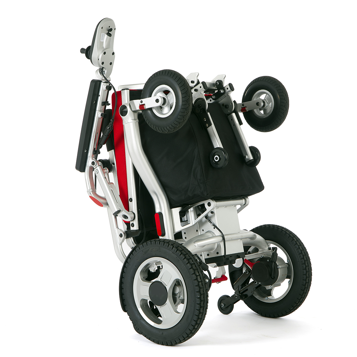Aerolite Trekker Powerchair Folded and Stored Upright.jpg